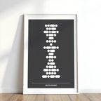 Framed artwork with a design of stacked white shapes on a dark background, mounted on a white wall.