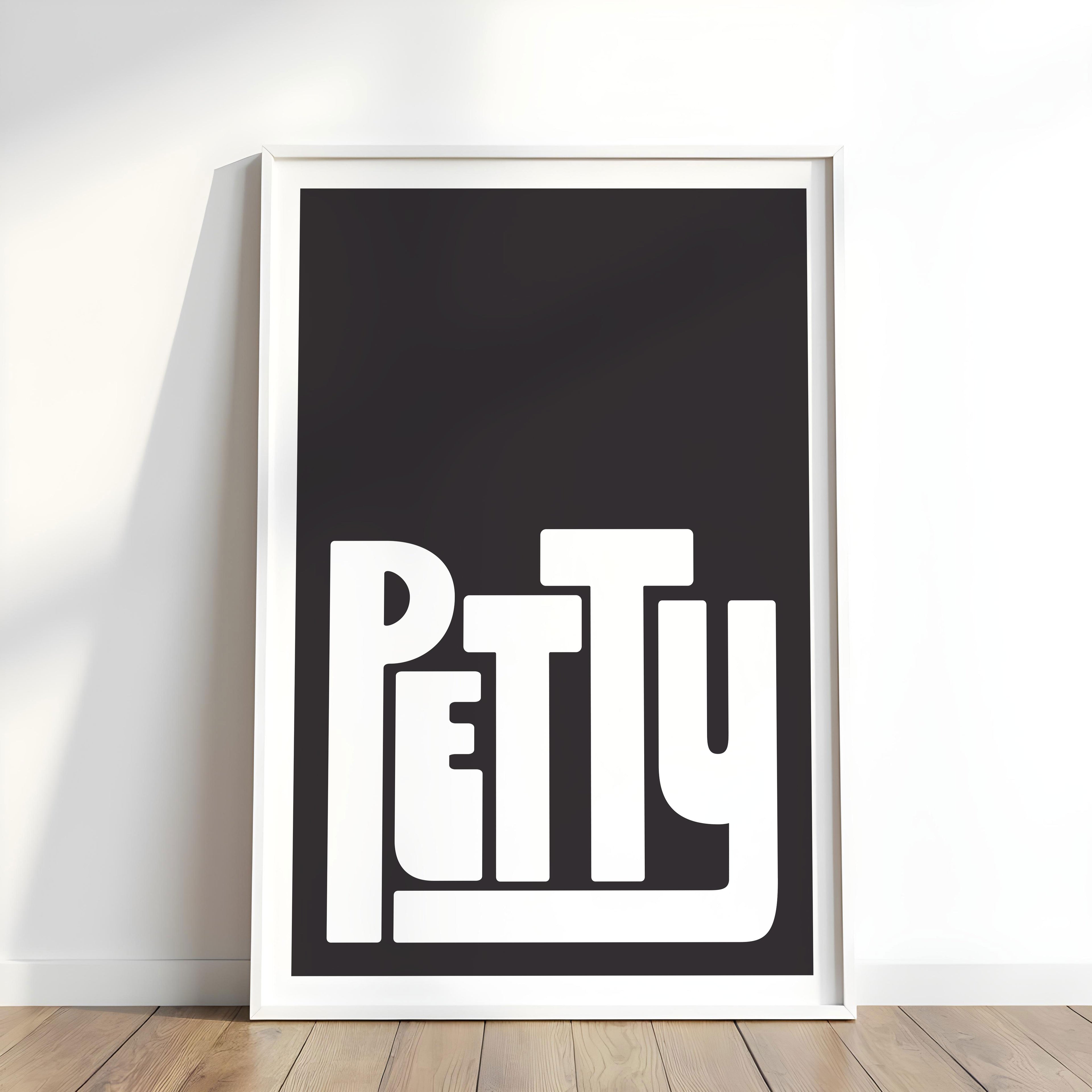 Framed artwork with the word 'Petty' on a black background
