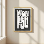 Framed artwork with 'WONDERFUL' text on a wall.